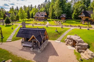 an aerial view of a park with a house at Loft Na Stodole z jaskinią SPA - Osada Jaworzyny in Zawadka