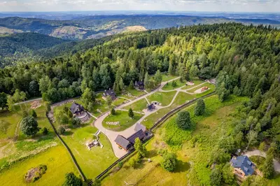 an aerial view of a estate with a park at Loft Na Stodole z jaskinią SPA - Osada Jaworzyny in Zawadka