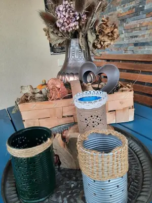 a group of baskets sitting on a table with a vase at Apartament Emmi in Imielin