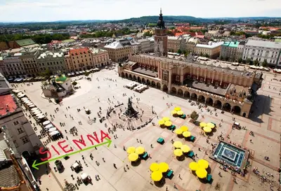 an aerial view of a city with umbrellas at Sienna 3 OLD TOWN in Kraków
