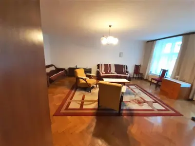 a living room with a couch and chairs at Sienna 3 OLD TOWN in Kraków
