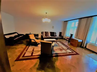 a living room with a couch and chairs at Sienna 3 OLD TOWN in Kraków