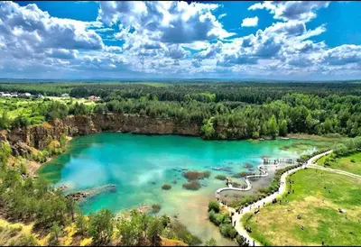 an aerial view of a lake in the woods at Gościniec nad Zalewem Sosina in Jaworzno