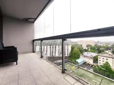 a balcony with a view of a city at Sołtysa Dytmara 3 by Homeprime in Kraków