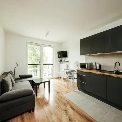 Wygodny apartament niedaleko centrum by Krakow Home