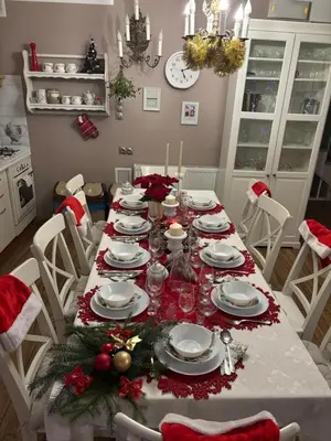a dining room table with christmas decorations on it at Koperkowe Rancho Beskid Wyspowy Domek Małopolskie KAMIONNA in Kamionna