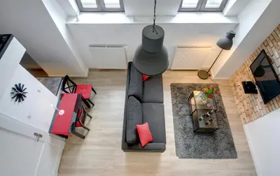 an overhead view of a living room with a couch at Apartament Romantyczny Zamkowa15 in Kraków