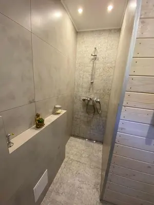 a bathroom with a shower and a sink at Forest house in Targanice