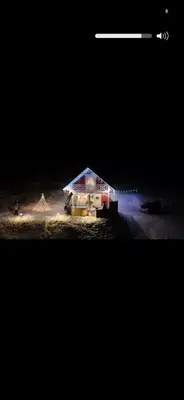 a camper is parked on the side of the road at night at Forest house in Targanice