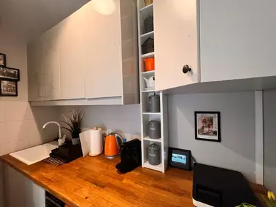 a kitchen with a counter with a computer on it at Jewish District in Krakow/ Kraków Kazimierz in Kraków