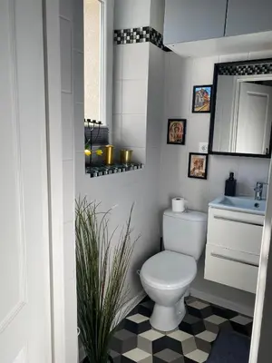 a bathroom with a white toilet and a sink at Jewish District in Krakow/ Kraków Kazimierz in Kraków