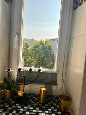 a bathroom with a view of a window and a tub at Jewish District in Krakow/ Kraków Kazimierz in Kraków