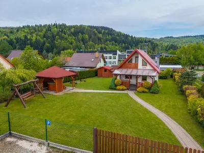 an aerial view of a yard with a house at Kamyczkowy domek w Zawoi in Zawoja