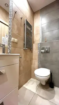 a bathroom with a toilet and a shower at Double Studio City Center in Kraków