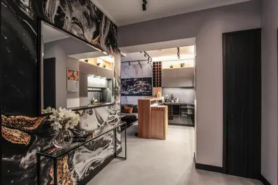 a living room with a large mirror on the wall at EXCLUSIVE APARTMENTS ZATOR in Zator