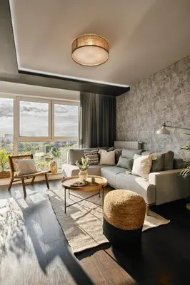 a living room with a couch and a table at Vermelo Boho Apartment in Kraków