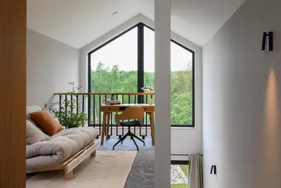 a living room with a couch and a table at Bukowy Las in Lipnica Górna
