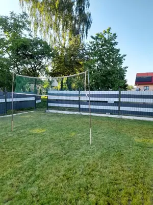 a soccer net in a field with a fence at Wypoczynek nad Dunajcem in Jurków