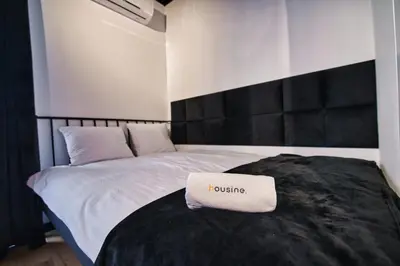 a bed with a sign that reads i cuisine at Zadzior4 by Housine in Zator