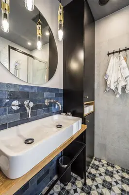 a bathroom with a sink and a mirror at Charming apartment in the Old Town in Kraków
