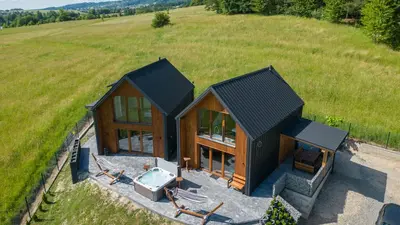 an overhead view of a house in a field at Domki pod Luboniem in Rabka