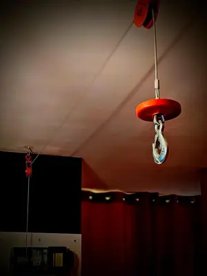 a red chandelier hanging from the ceiling in a room at BDSM Elysium Playsuite in Kraków