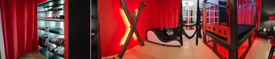 a room with red curtains and snowboards in a store at BDSM Elysium Playsuite in Kraków