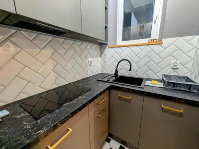 a kitchen with a sink and a counter top at Bonerowska 5 by Homeprime in Kraków
