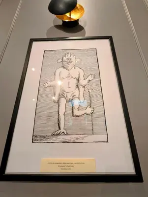 a framed picture of a man on a wall at Bonerowska 5 by Homeprime in Kraków
