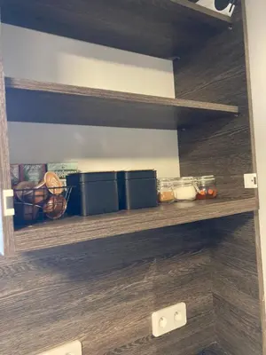 a bathroom with a white toilet and a staircase at Apartament G76 free parking in Kraków