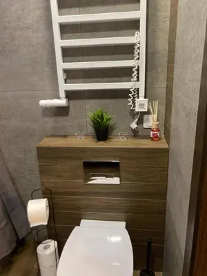 an office with a desk with two monitors and a chair at Apartament G76 free parking in Kraków
