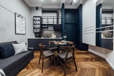 a living room with a table and a couch at CityPlace Apartment Starowiślna 43 in Kraków