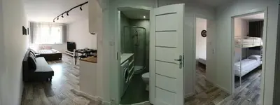 a room with a bedroom with a bunk bed at Apartamenty Oświęcim klimatyzacja air-conditioned in Oświęcim