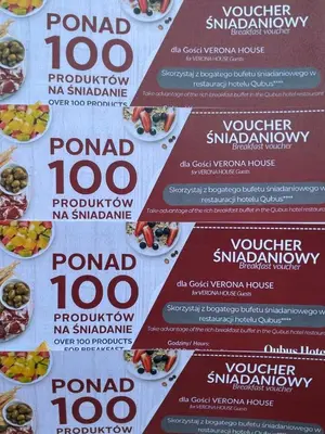 a bunch of signs with food on them at Verona House - Premium Apartment in Kraków