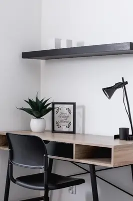 a desk with a black chair and a lamp at Stawowa Apartment with Balcony & Parking Cracow by Noclegi Renters in Kraków