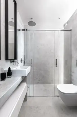 a bathroom with a shower and a sink and a toilet at Deluxe apartment in City Center, Steam Park in Kraków