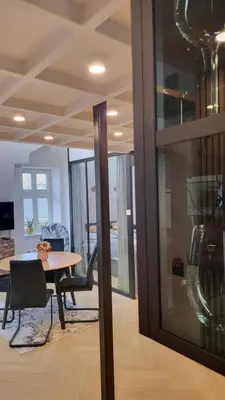 a room with a table and a dining room at Old Town Apartment, Starowiślna in Kraków