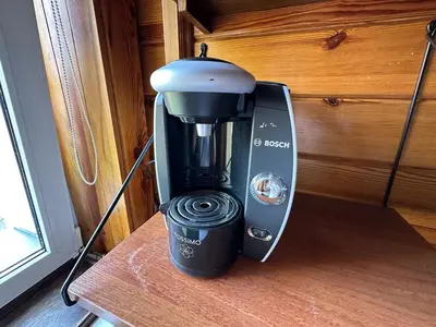 a coffee maker sitting on top of a table at Przestronny apartament w centrum miasta - Mszana M11 in Mszana Dolna