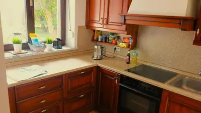 a kitchen with a sink and a counter top at AirSpot Balice in Cholerzyn