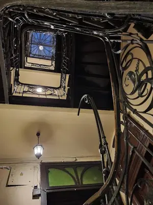 a view of a room with a window and a staircase at Z-1 Kraków Old Town O&P ApartFamily in Kraków