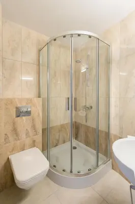 a bathroom with a shower with a toilet and a sink at Agroturystyka Premium Cracovia Arabians - Ojcowski Park Narodowy in Maszyce