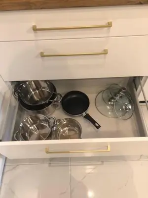 a kitchen stove with pots and pans on it at Apartament Aktorów Bronowice in Kraków