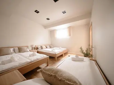 a living room with two beds and a couch at Sweet Dreams Apartment in Zator
