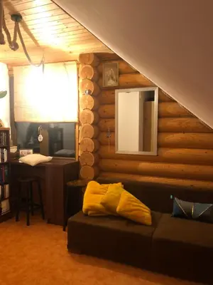 a bedroom with a bed and a mirror and a desk at Ranczo Borówka in Łapanów