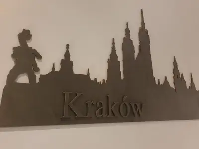 a black silhouette of a krakow sign on a wall at L-2 Kraków Center Studio O&P ApartFamily in Kraków