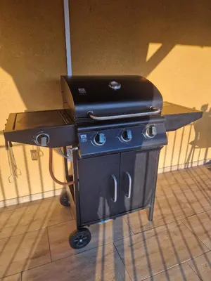 a black stove with a laptop on top of it at Stefczyka 119 in Bachowice