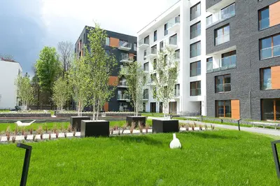 a rendering of a park in front of a building at Novum City Center, Sun & Snow in Kraków