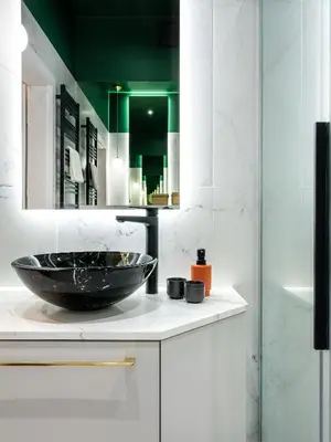 a bathroom with a black bowl on a counter at GREEN CHILL Apt Old Town & Wawel Hill by Vistula River - by Homelike Krakow in Kraków