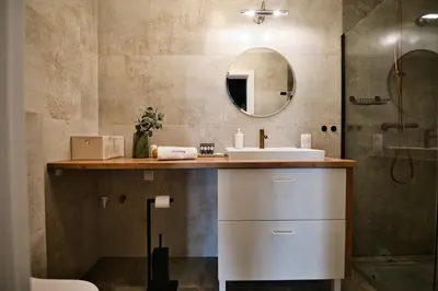 a bathroom with a sink and a mirror at Pankrac 2 by Housine in Zator