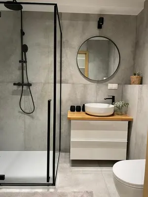 a bathroom with a shower and a sink and a mirror at APARTAMENT AMZOHA in Zator